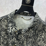 Close-up detail shot of Louis Vuitton luxury clothing with runway-inspired design