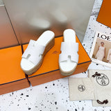 Hermes sandals Style 155 - close-up of sleek modern silhouette