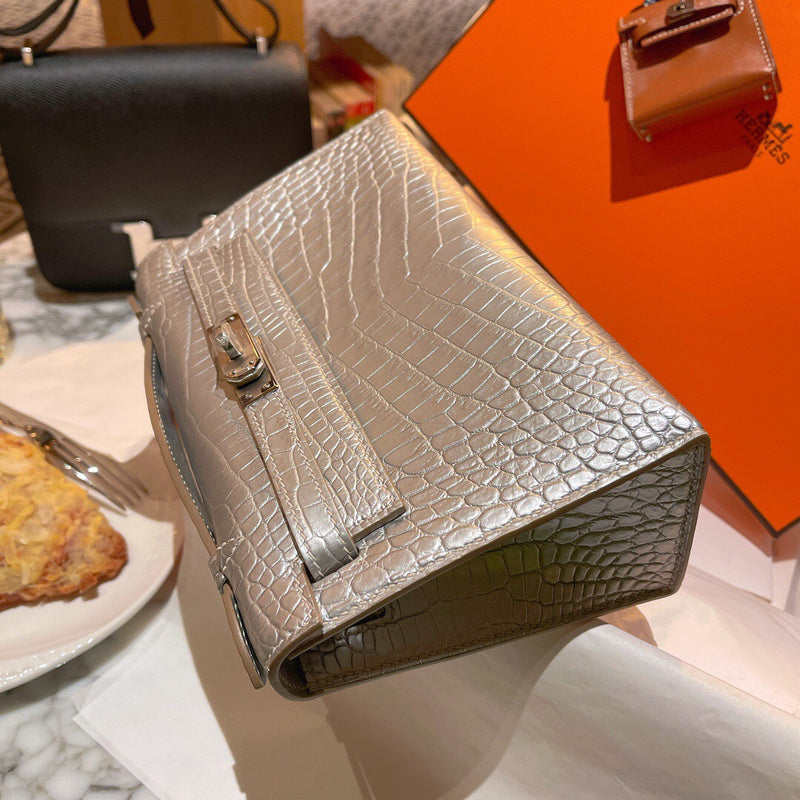 Side view of minimalist structured handbag
