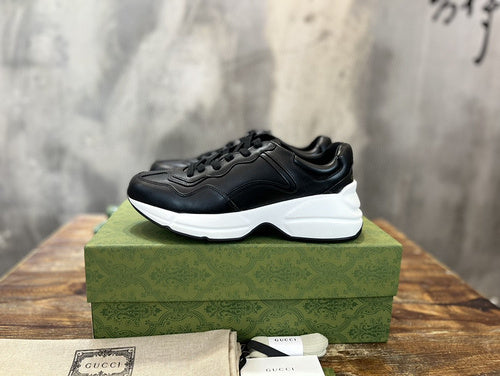 Gucci crisp white luxury sneakers view 11 retro runner design
