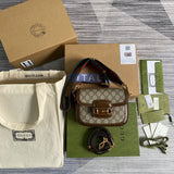 Styled lifestyle shot of structured statement women's handbag – women's luxury accessory
