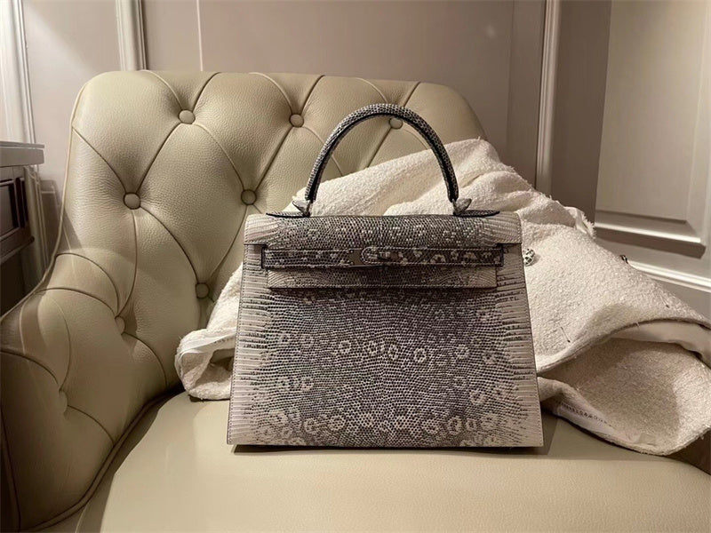  Structured top-handle bag carried on shoulder