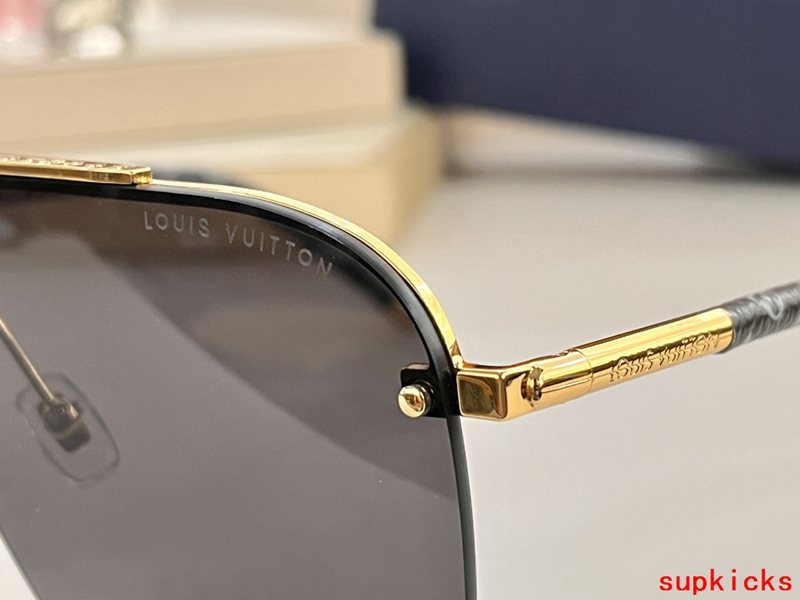 Close-up detail view of Louis Vuitton unisex sunglasses