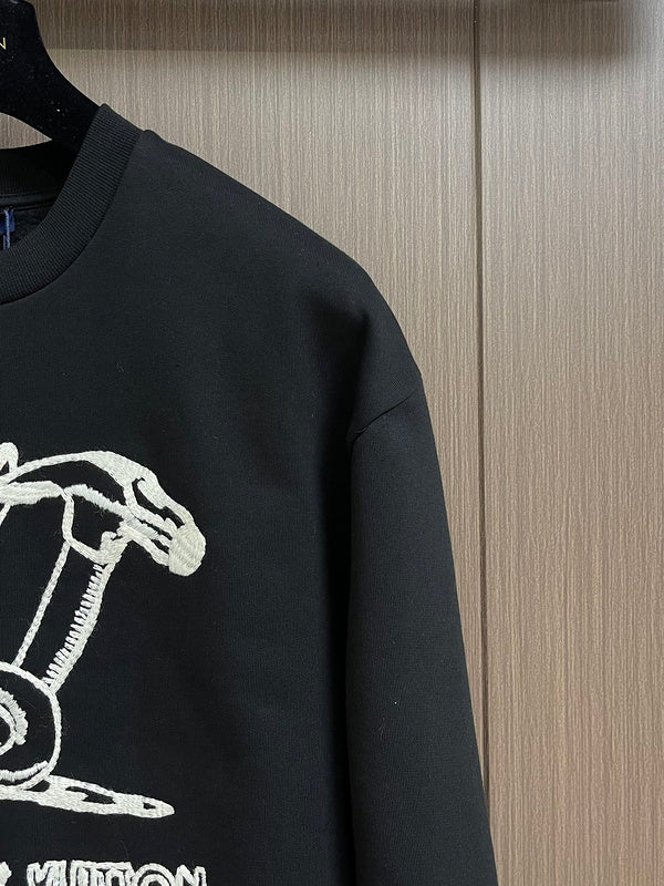 Full styled look of Louis Vuitton luxury clothing with logo-detail design