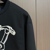 Full styled look of Louis Vuitton luxury clothing with logo-detail design