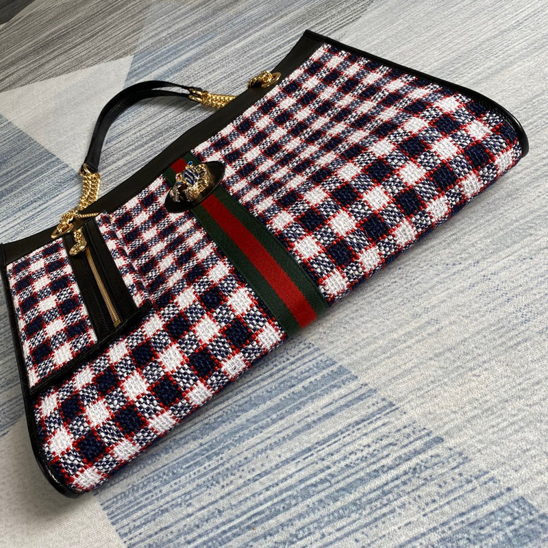 Styled lifestyle shot of modern everyday-luxe women's handbag – women's statement bag