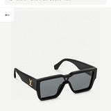 Close-up detail view of Louis Vuitton unisex sunglasses
