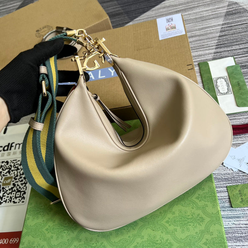 Front view of refined chic women's handbag – women's statement bag