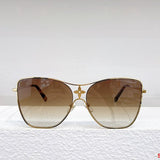 Close-up detail view of Louis Vuitton unisex sunglasses