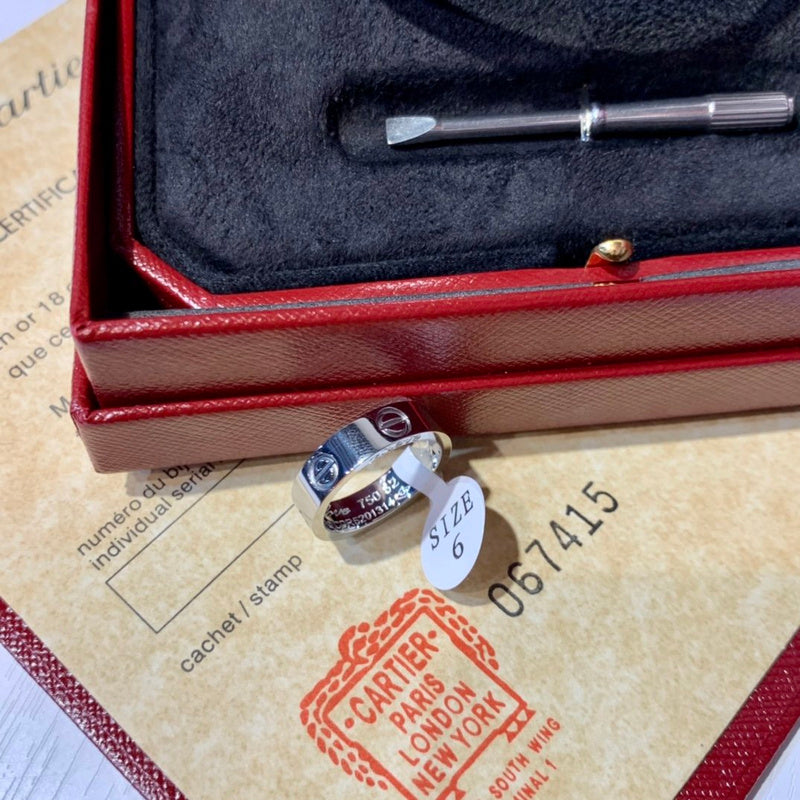 Side view of Cartier unisex jewelry piece
