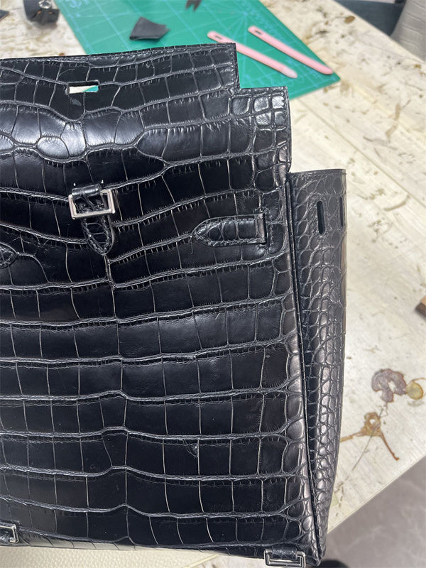 Side view of tailored structured handbag
