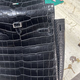 Side view of tailored structured handbag