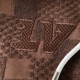 Flat lay presentation of Louis Vuitton luxury clothing with everyday silhouette