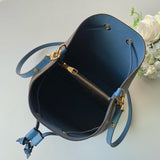 Side profile of statement structured women's handbag – women's luxury handbag
