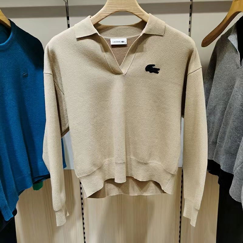 Flat lay presentation of Lacoste luxury clothing with monogram-inspired silhouette