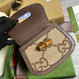 Close-up detail of structured signature women's handbag – women's statement bag