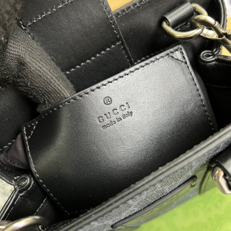 Side profile of refined classic women's handbag – women's statement bag