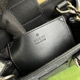 Side profile of refined classic women's handbag – women's statement bag
