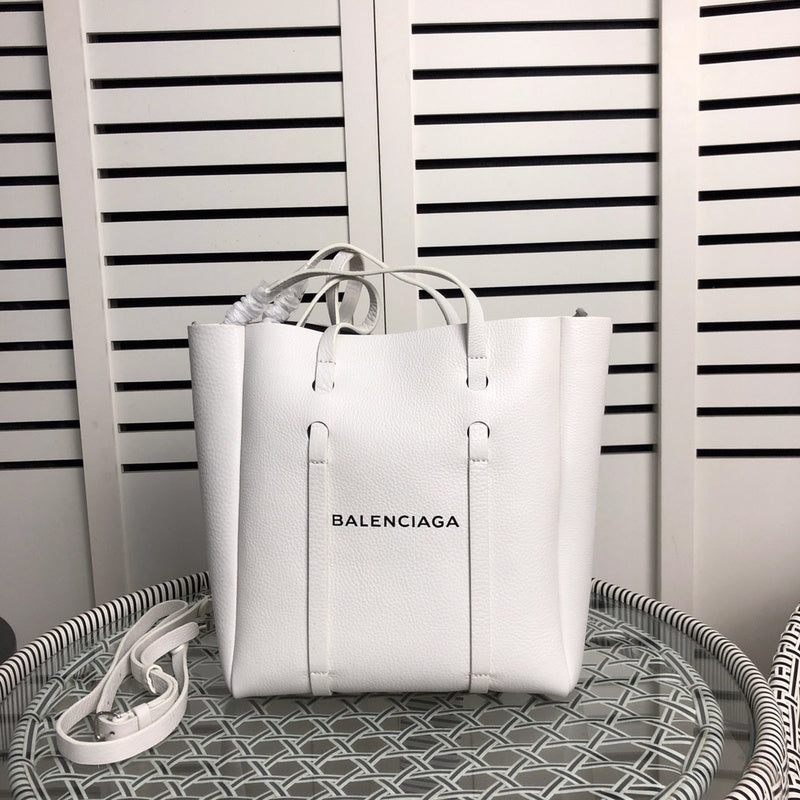 Side profile of modern refined women's handbag – women's statement bag