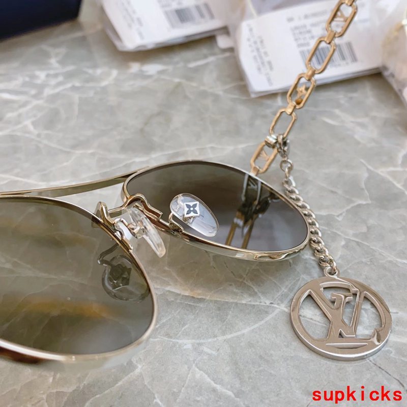 Lifestyle view of Louis Vuitton unisex sunglasses