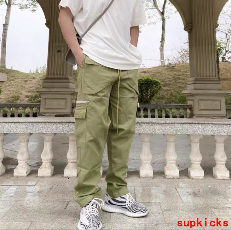 Side profile of Rhude luxury clothing with monogram-inspired silhouette