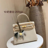  Elegant structured bag carried on shoulder