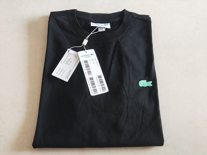 Flat lay presentation of Lacoste luxury clothing with tailored silhouette
