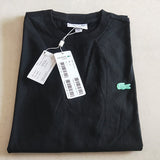 Flat lay presentation of Lacoste luxury clothing with tailored silhouette