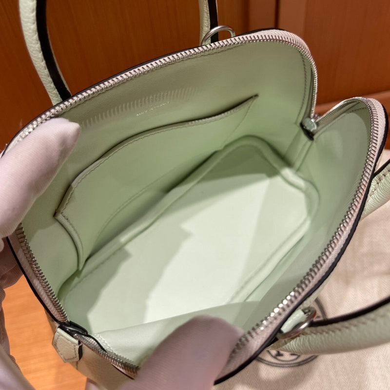 Side view of sleek structured handbag