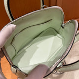 Side view of sleek structured handbag