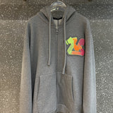 Side profile of Louis Vuitton luxury clothing with label-forward styling