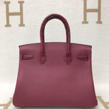 Side view of modern structured handbag