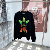 Side profile of Gucci luxury clothing with logo-detail design