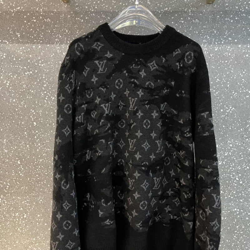 Back view of Louis Vuitton luxury clothing with label-forward styling