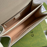 Close-up detail of statement sleek women's handbag – women's luxury accessory