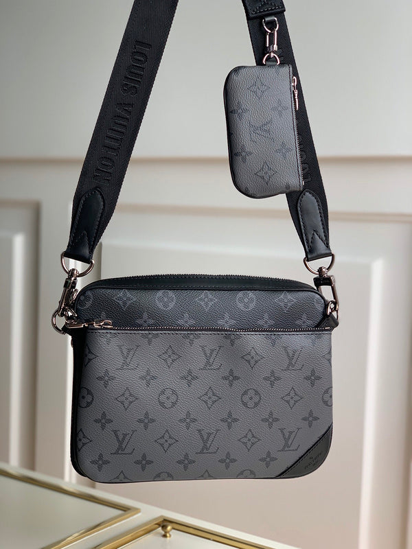 Handle and strap detail of structured signature women's handbag – women's statement bag
