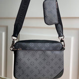 Handle and strap detail of structured signature women's handbag – women's statement bag