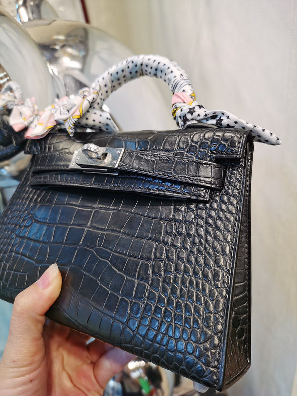 Side view of modern structured handbag