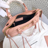 Close-up detail of chic structured women's handbag – women's everyday handbag