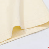 Close-up detail shot of Rhude luxury clothing with relaxed-fit cut