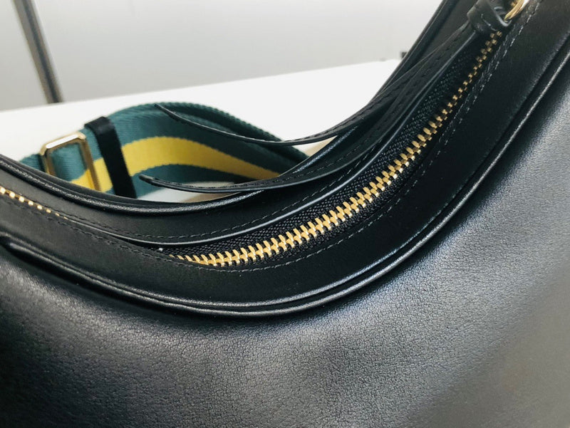 Back view of elevated signature women's handbag – women's designer-style accessory