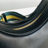 Back view of elevated signature women's handbag – women's designer-style accessory
