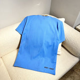 Front view of Moncler luxury clothing with signature branding