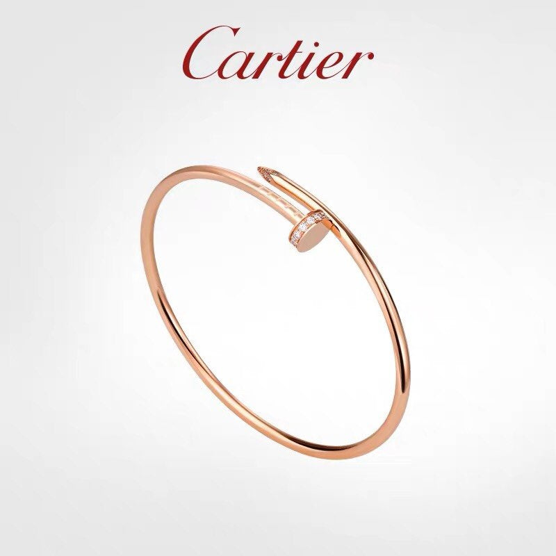 Front view of Cartier unisex jewelry piece