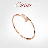 Front view of Cartier unisex jewelry piece
