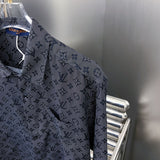 Full styled look of Louis Vuitton luxury clothing with label-forward styling