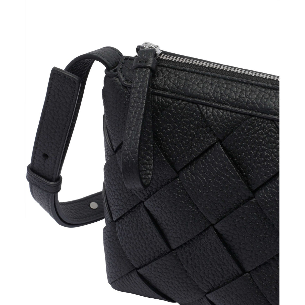 Close-up of Bottega Veneta cross body bags hardware and fine stitching