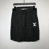 Full styled look of Louis Vuitton cotton t-shirt with label-forward styling