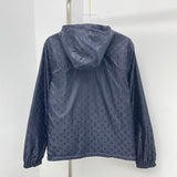 Back view of Louis Vuitton luxury clothing with tailored silhouette