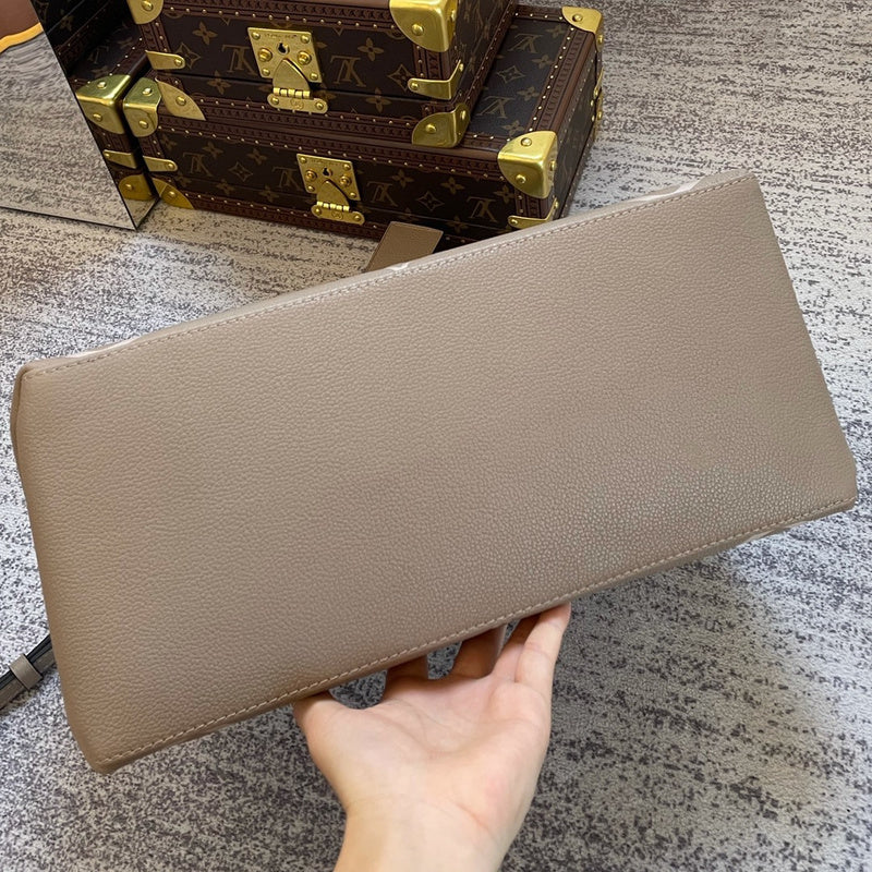 Styled lifestyle shot of premium refined women's handbag – women's luxury accessory